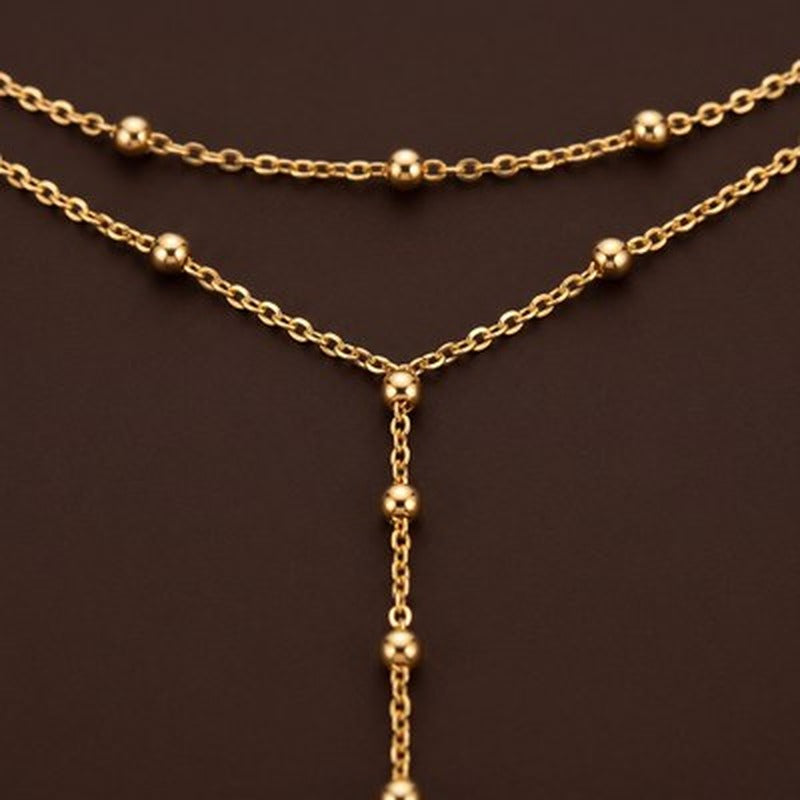 Layered Gold Necklace with Beaded Chain in gold