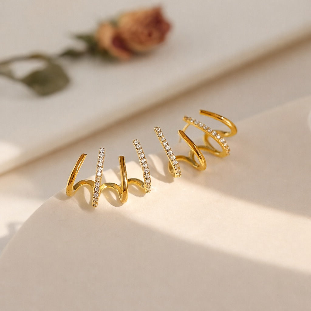 Spiral Gold Earrings with Pave Stones in gold