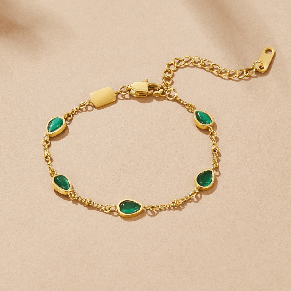 Green Stone Gold Bracelet with Chain Links in gold